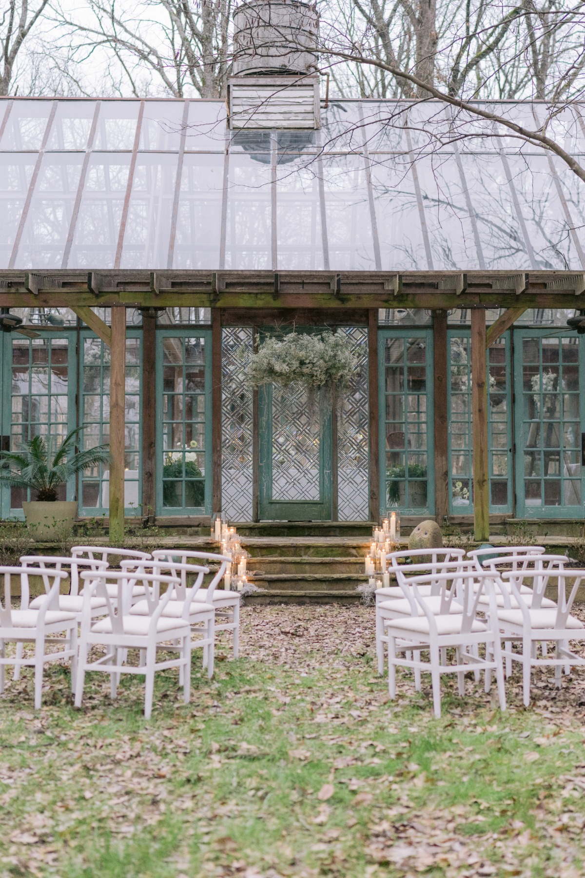 Glass greenhouse wedding ceremony 