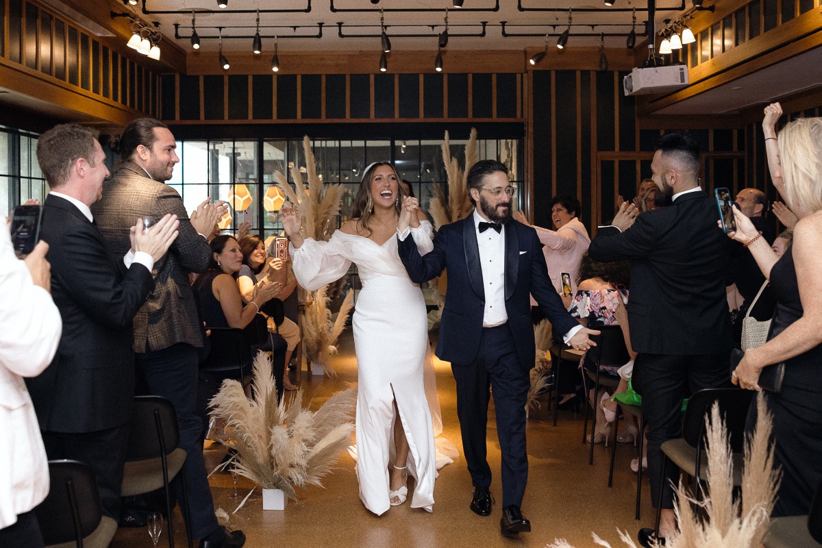 Newlywed cheers at NYC ceremony