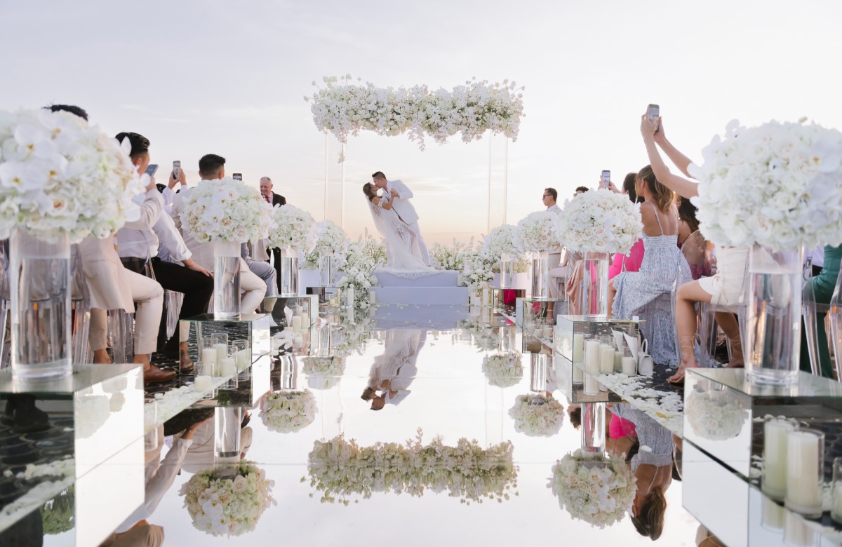 Romantic mirrored and floral wedding ceremony