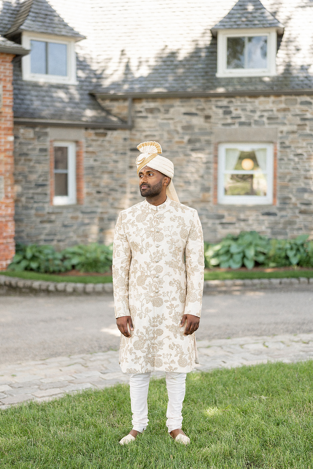 white and gold groom attire