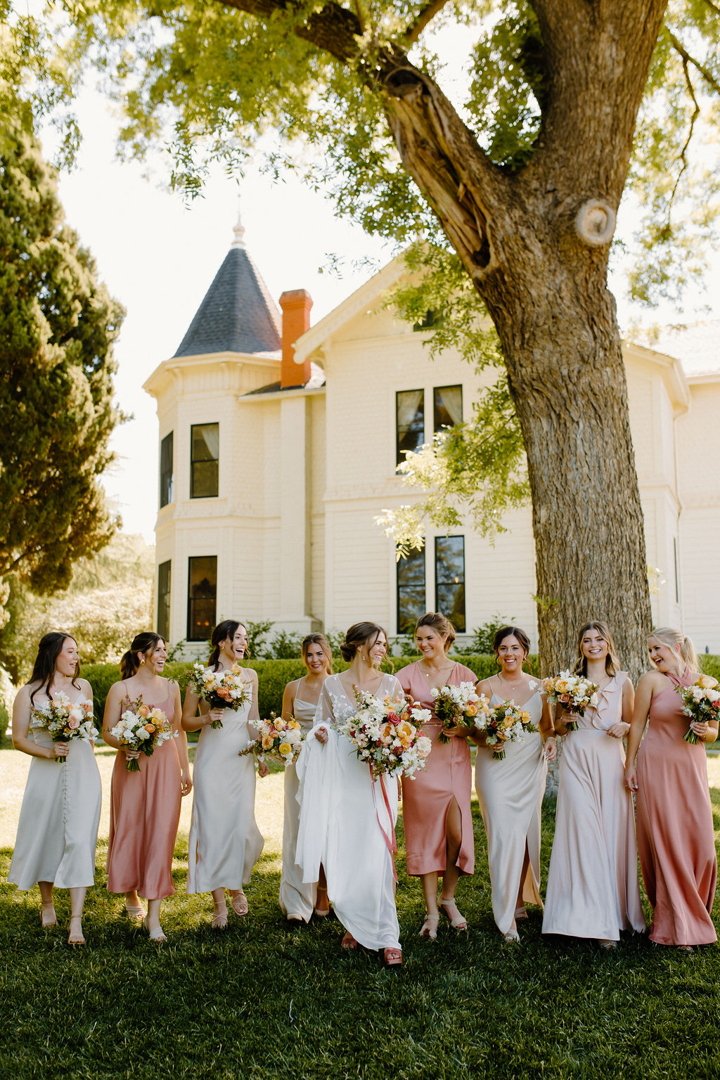 Boho bride with chic blush bridal party