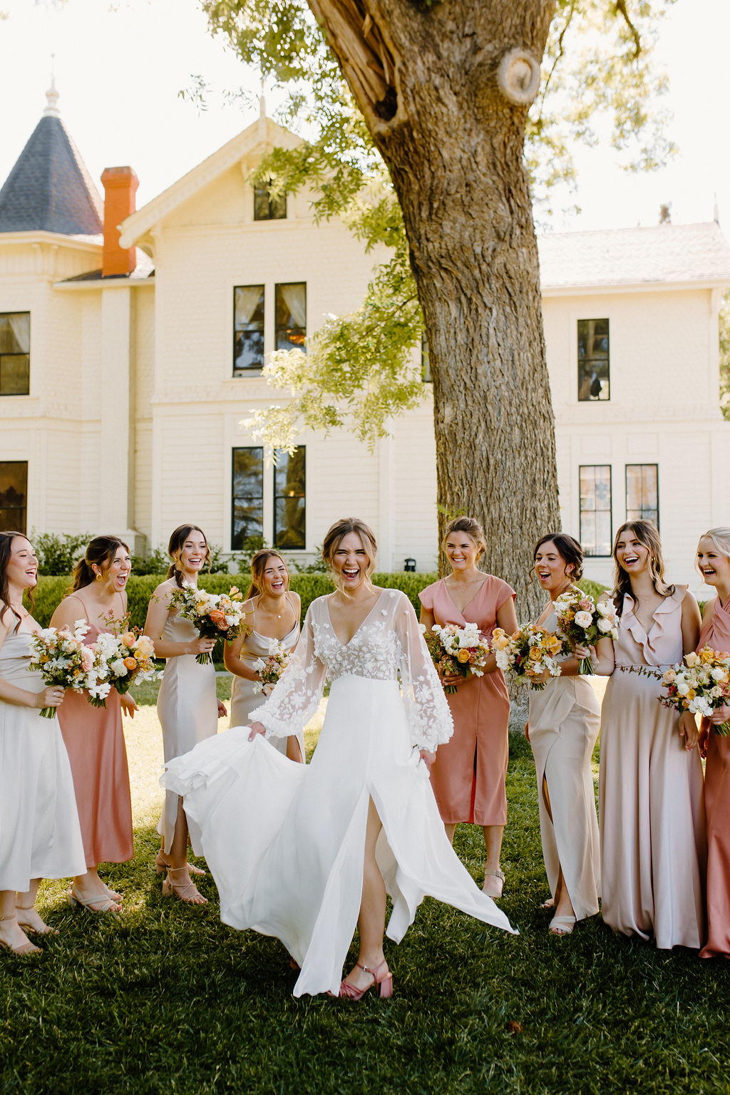 Boho bride with coral bridesmaids 