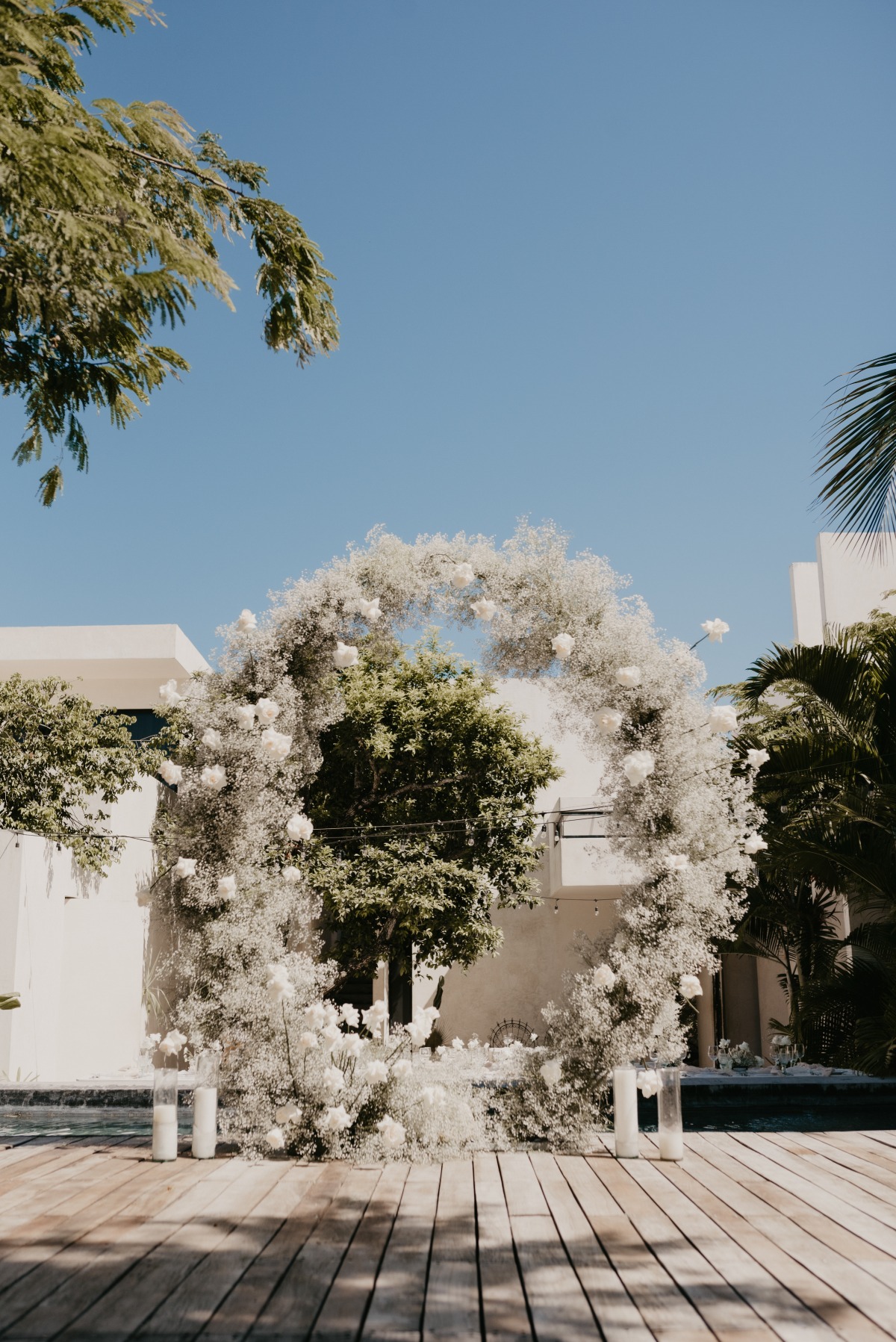 Baby's breath ceremony arch with candles