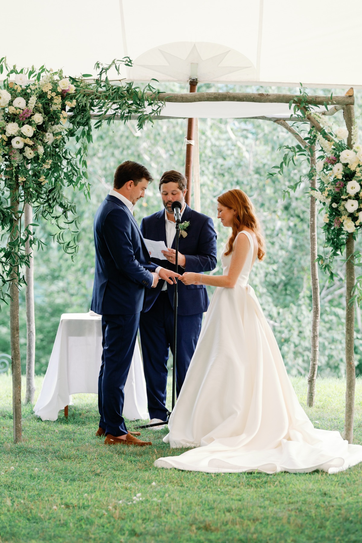 Emotional ceremony under floral chuppah 