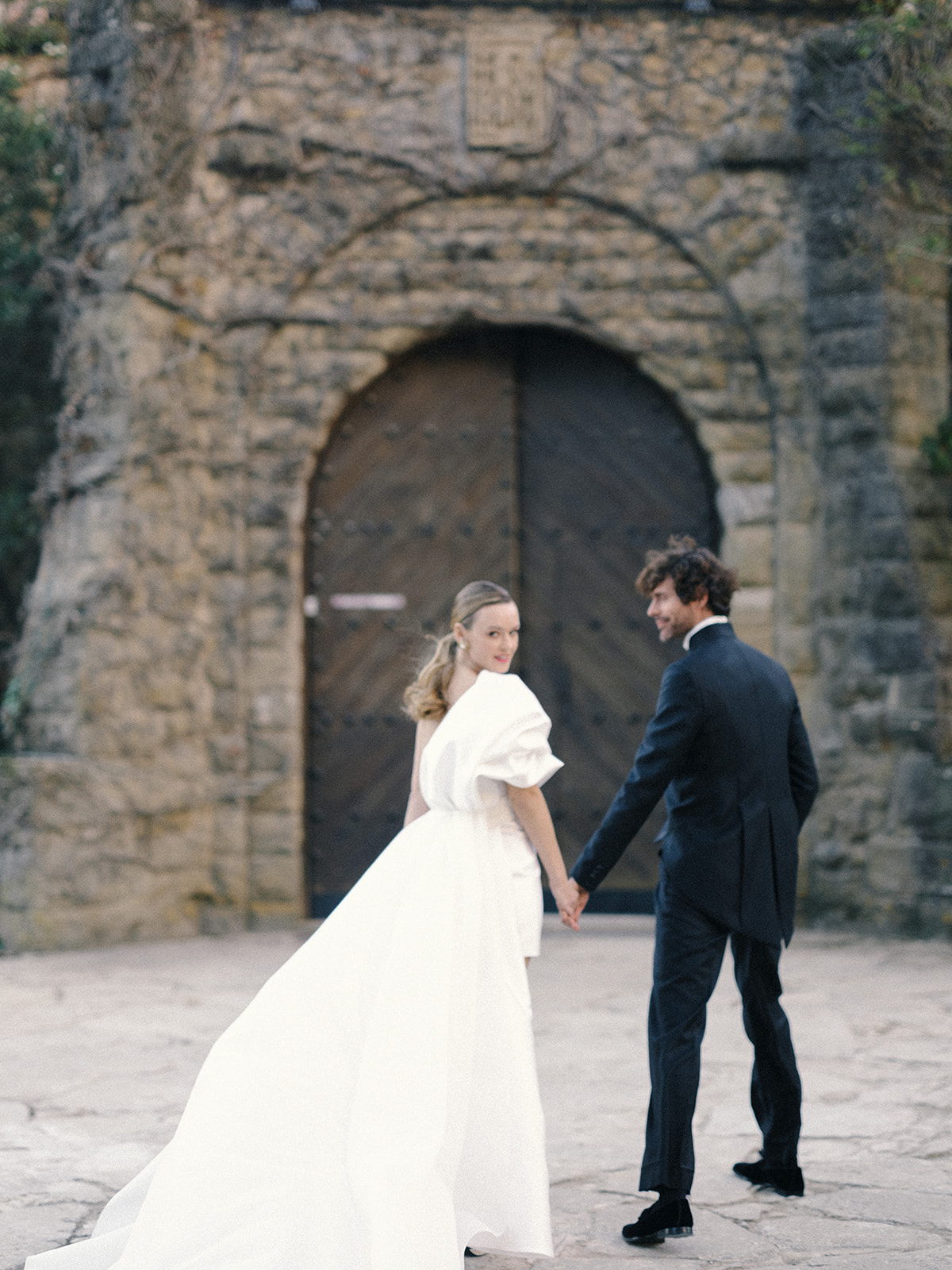 Modern wedding couple at Spanish castle