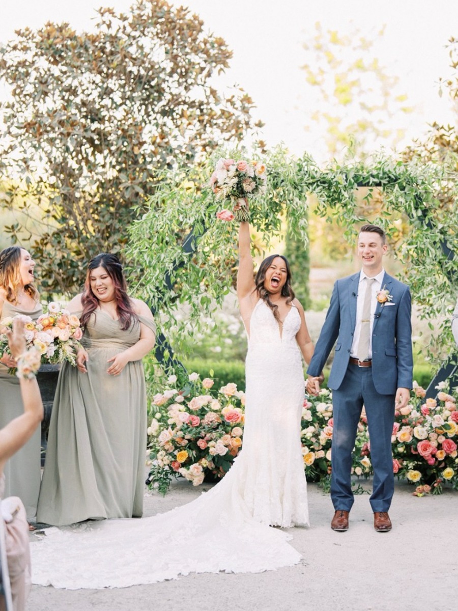 This bride's smile and happiness is infectious at her garden wedding