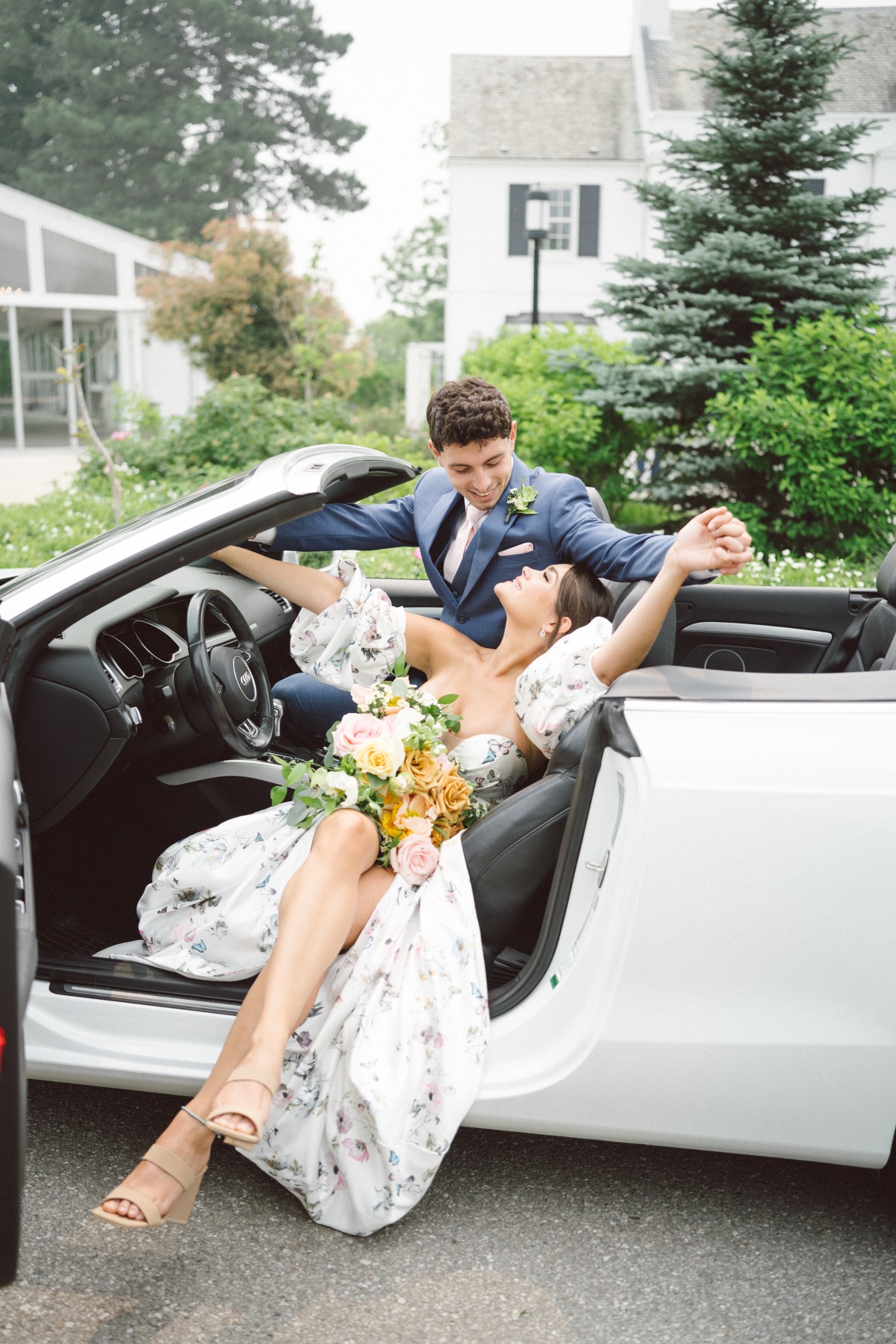European newlyweds in sports car