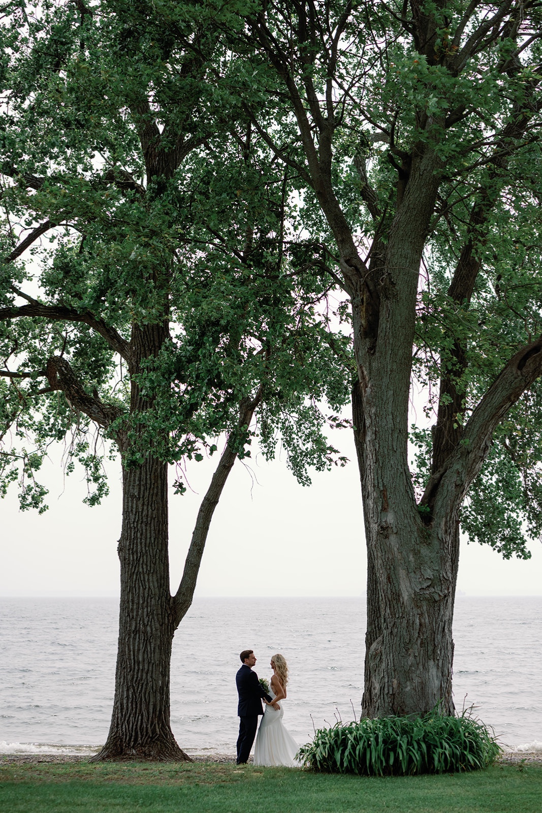 Lakefront wedding bride and groom 