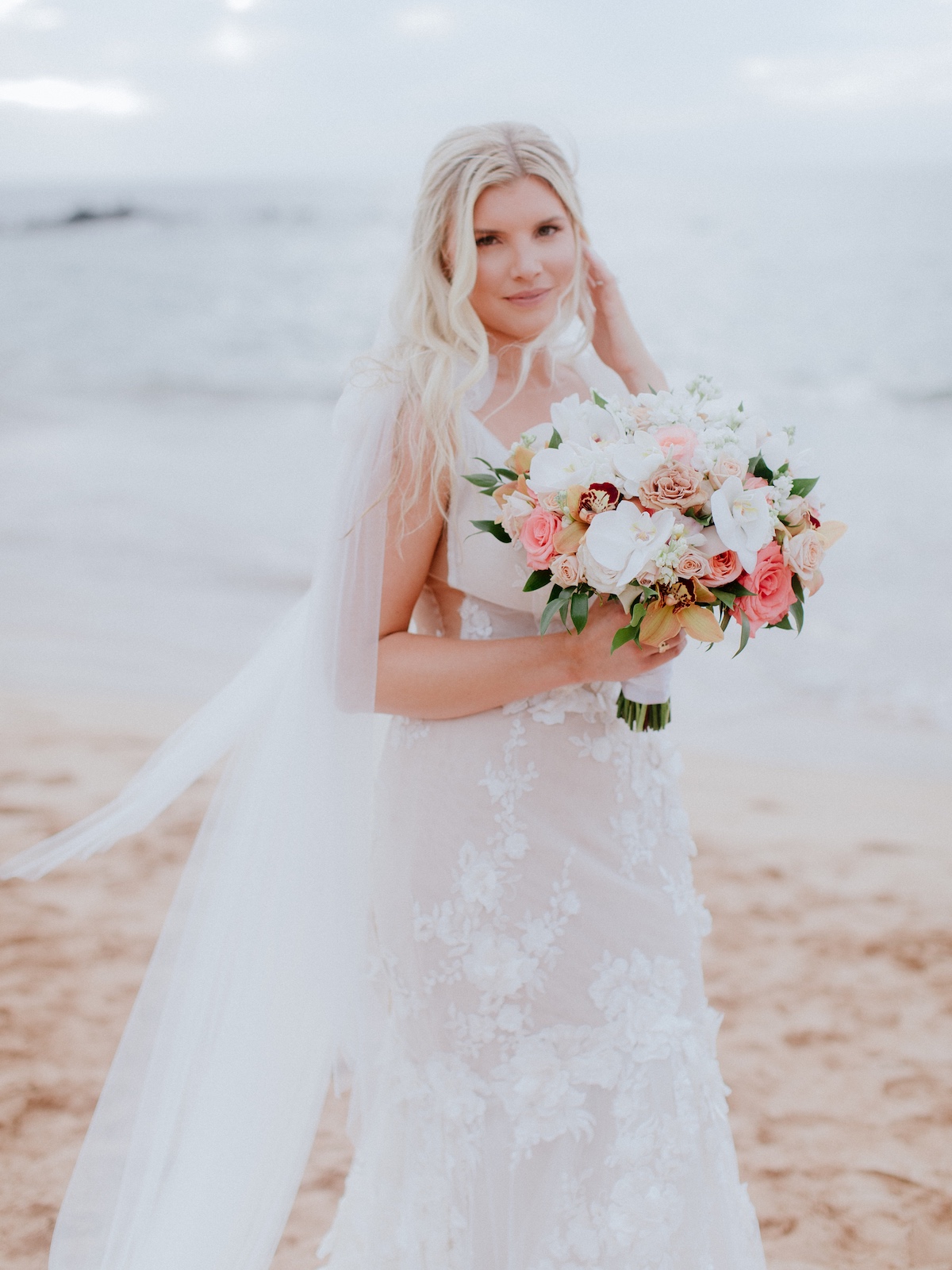 Maui bride with pink flowers 