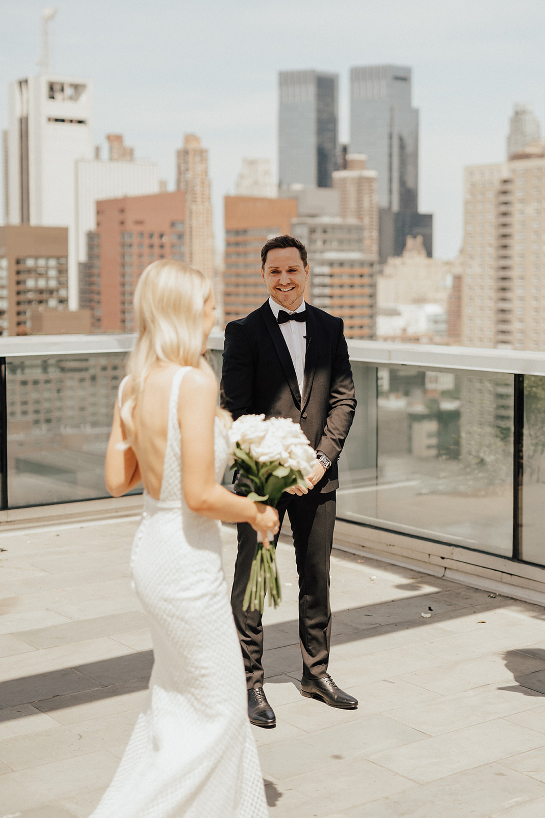 groom on rooftop elopement