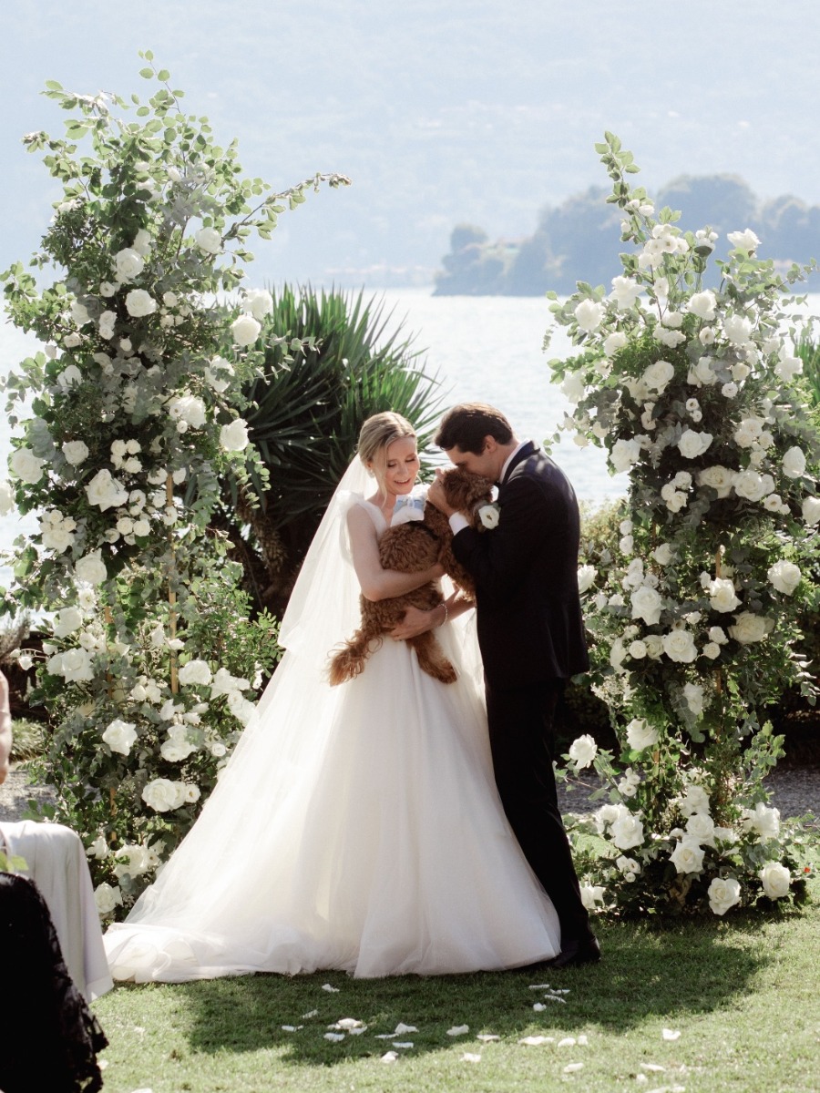 Wedding couple with dog ring bearer