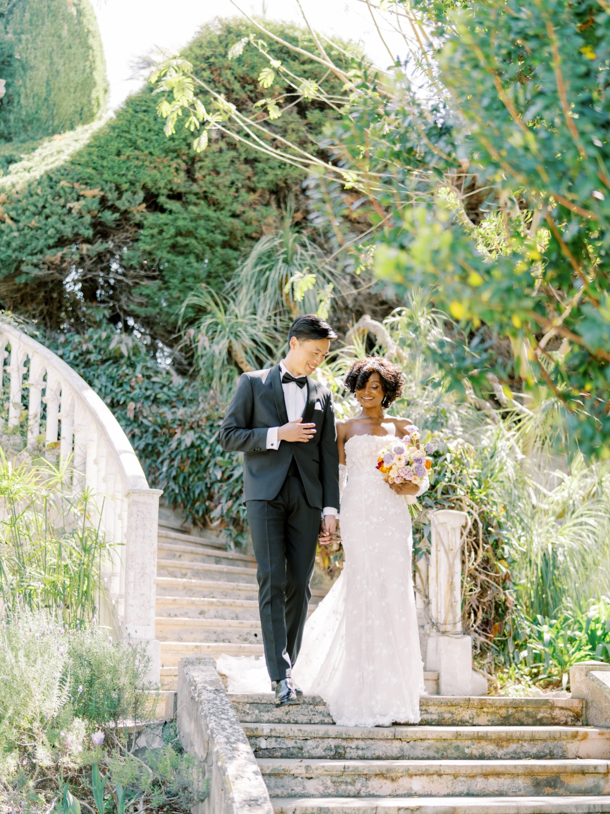 Bride and groom exploring French villa 