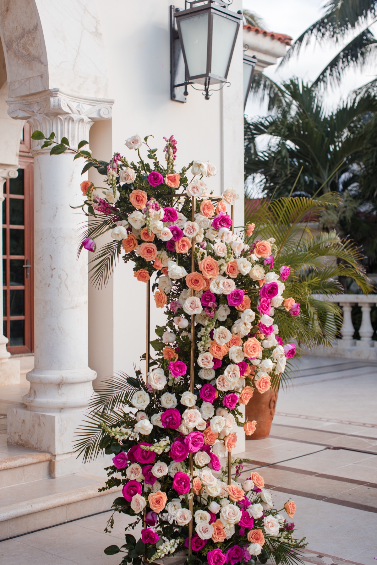 magenta peach and white floral installation