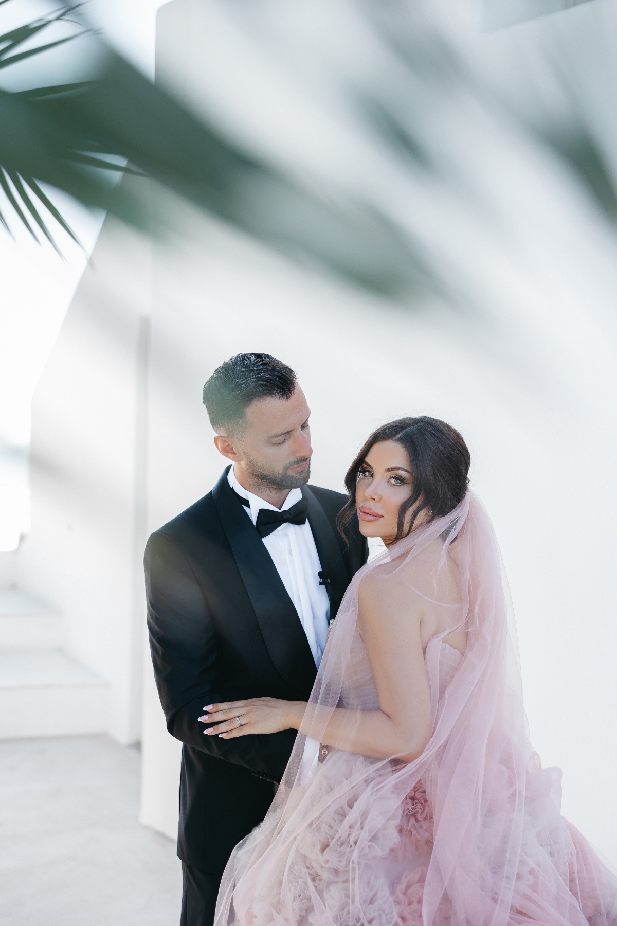 Luxury bride in pink with classic groom 