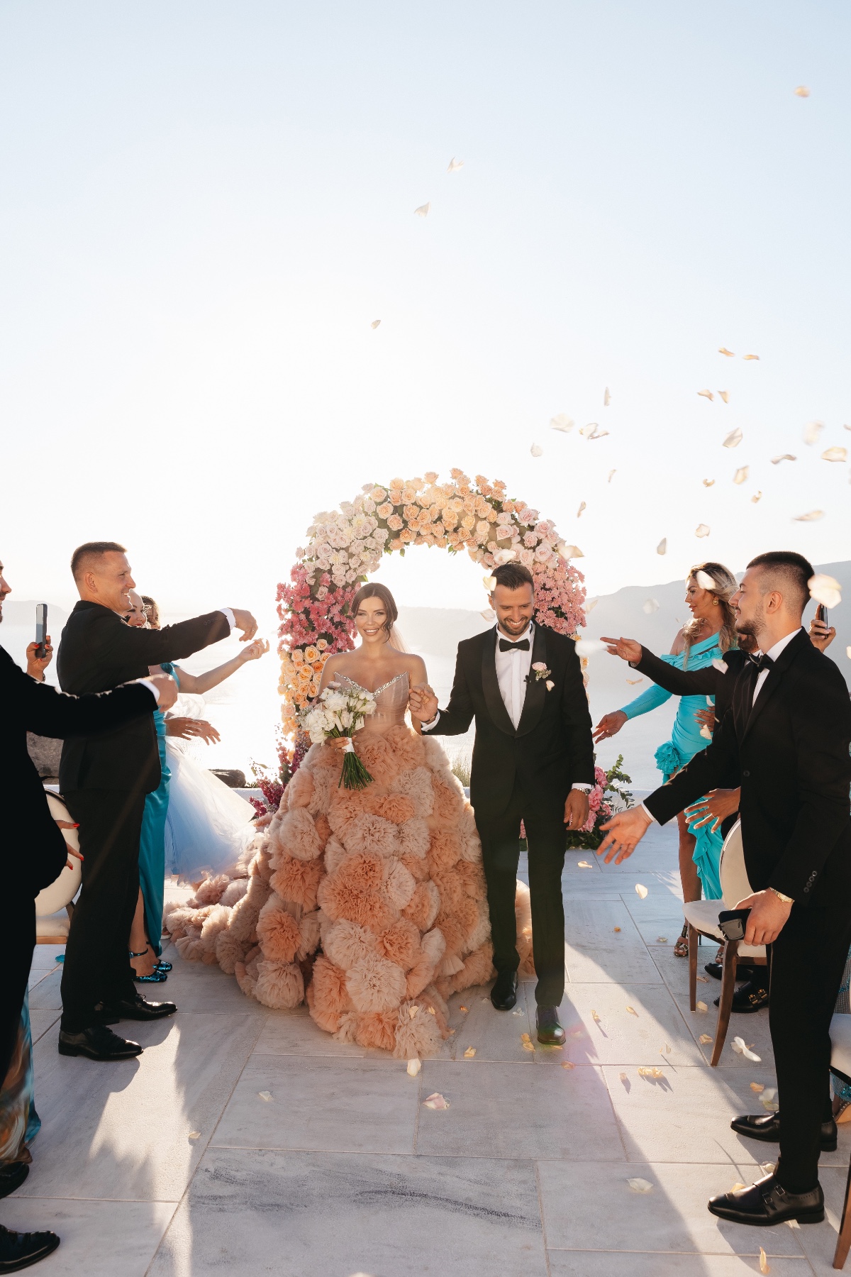 Couture bride and groom recessional 