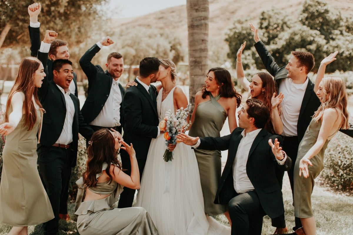 Sage green and monochrome bridal party 
