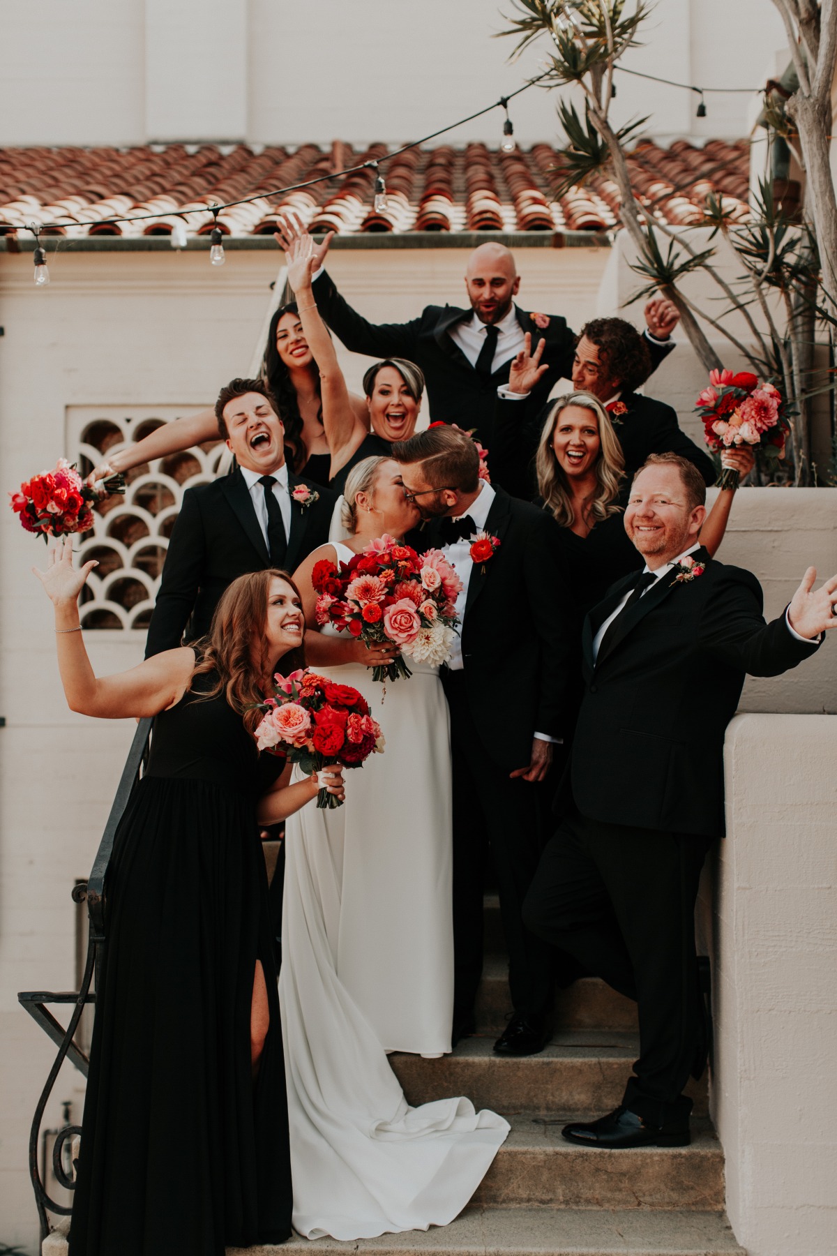 monochrome bridal party cheering 