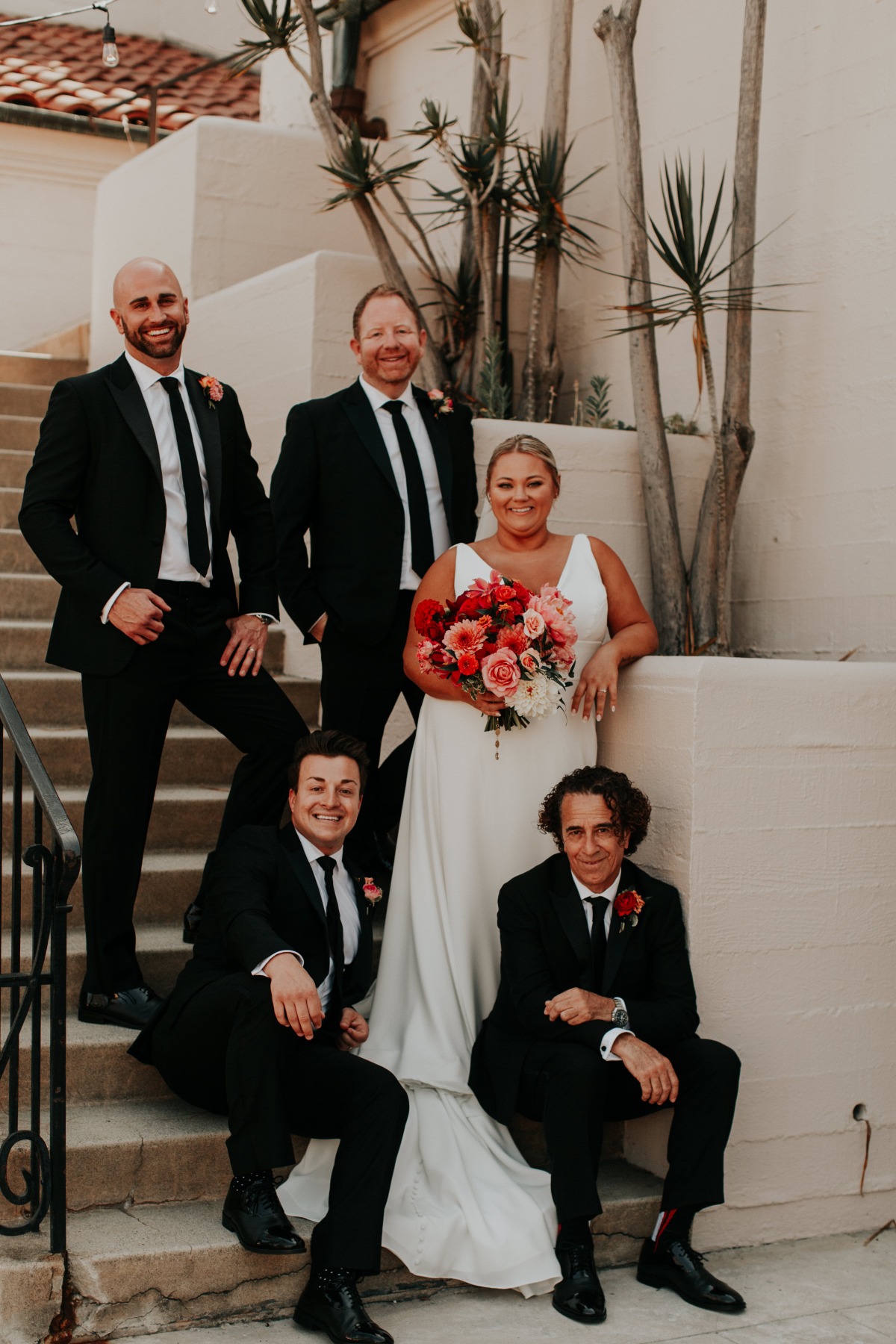 Classic groomsmen with modern bride 