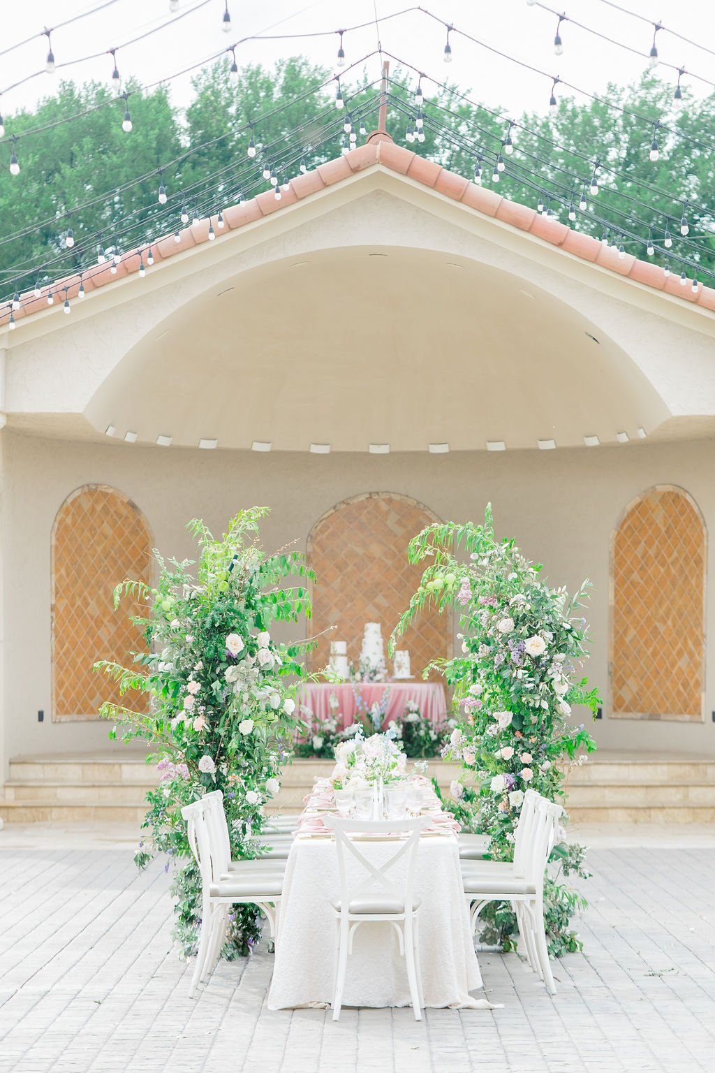 Modern floral arch reception table 
