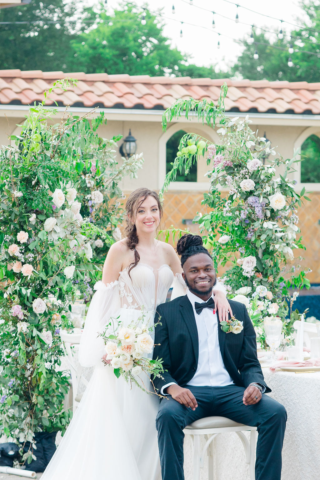 Romantic couple at floral reception 