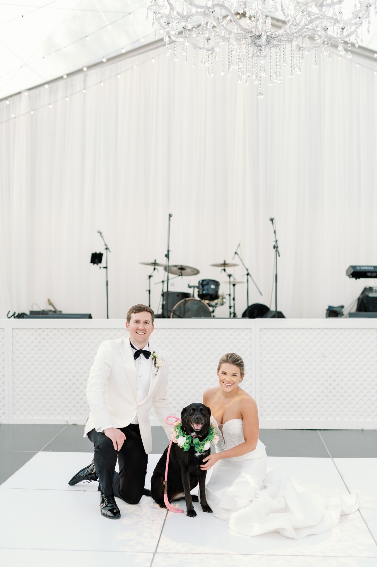 Couple with dog at dance floor 