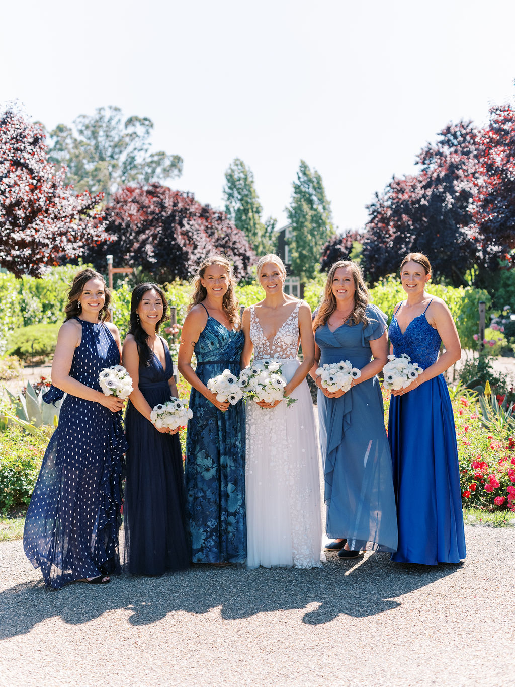 Mismatched blue bridesmaids 