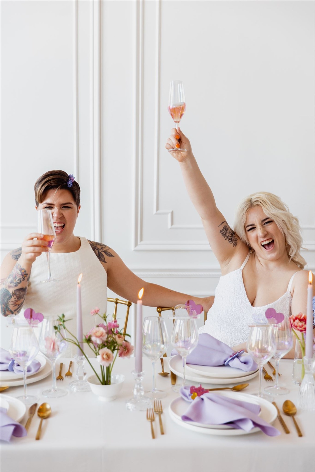 Queer couple toasting rose 