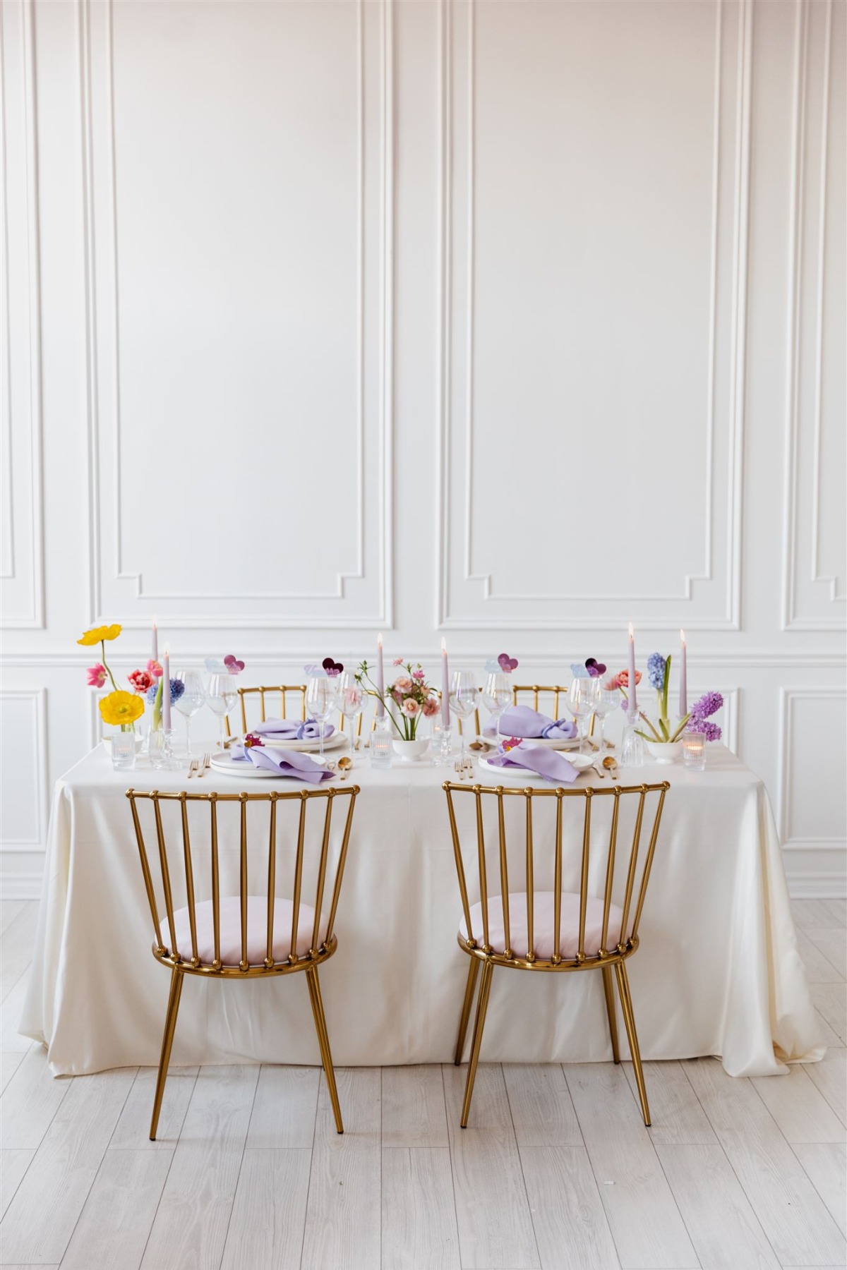 Lavender and rainbow sweetheart table 