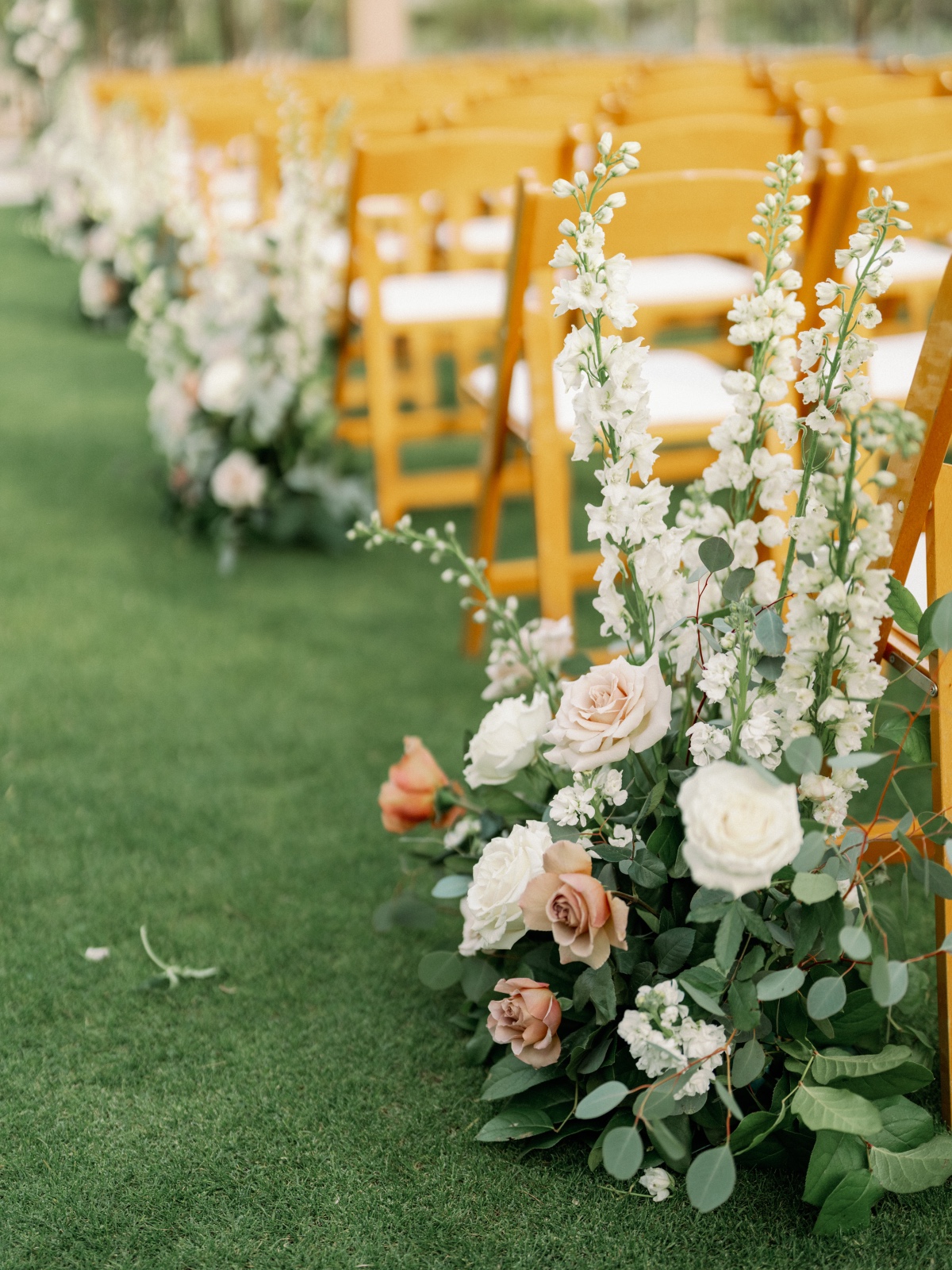 white blush and green floral arrangements