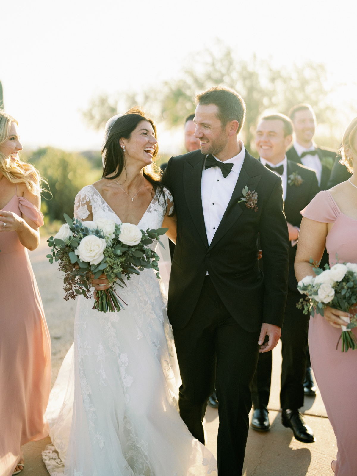 Romantic blush wedding with a sense of humor in the Arizona desert