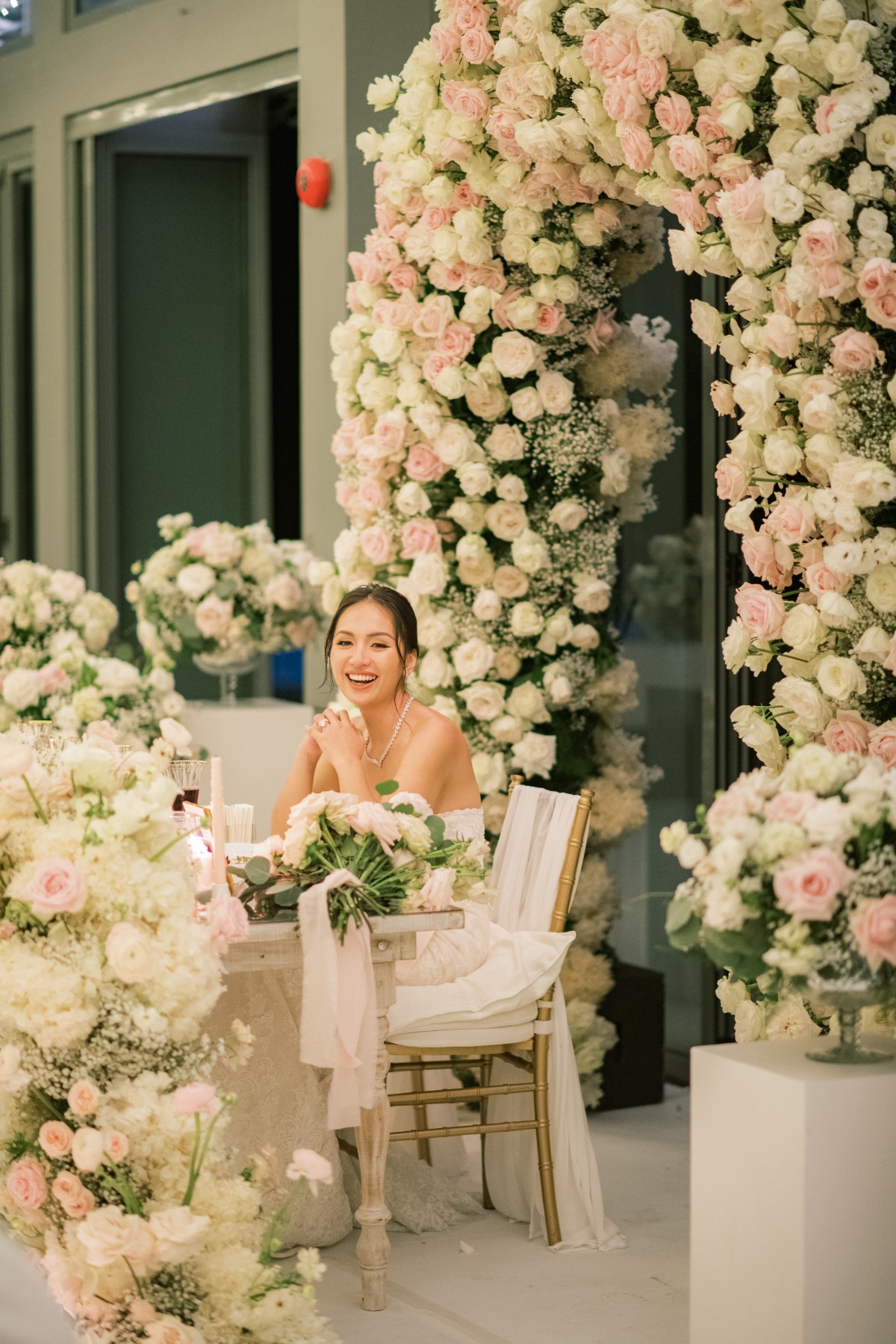 Thai bride at floral reception 