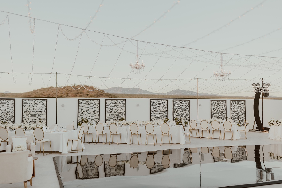 Chic white and gold resort reception 