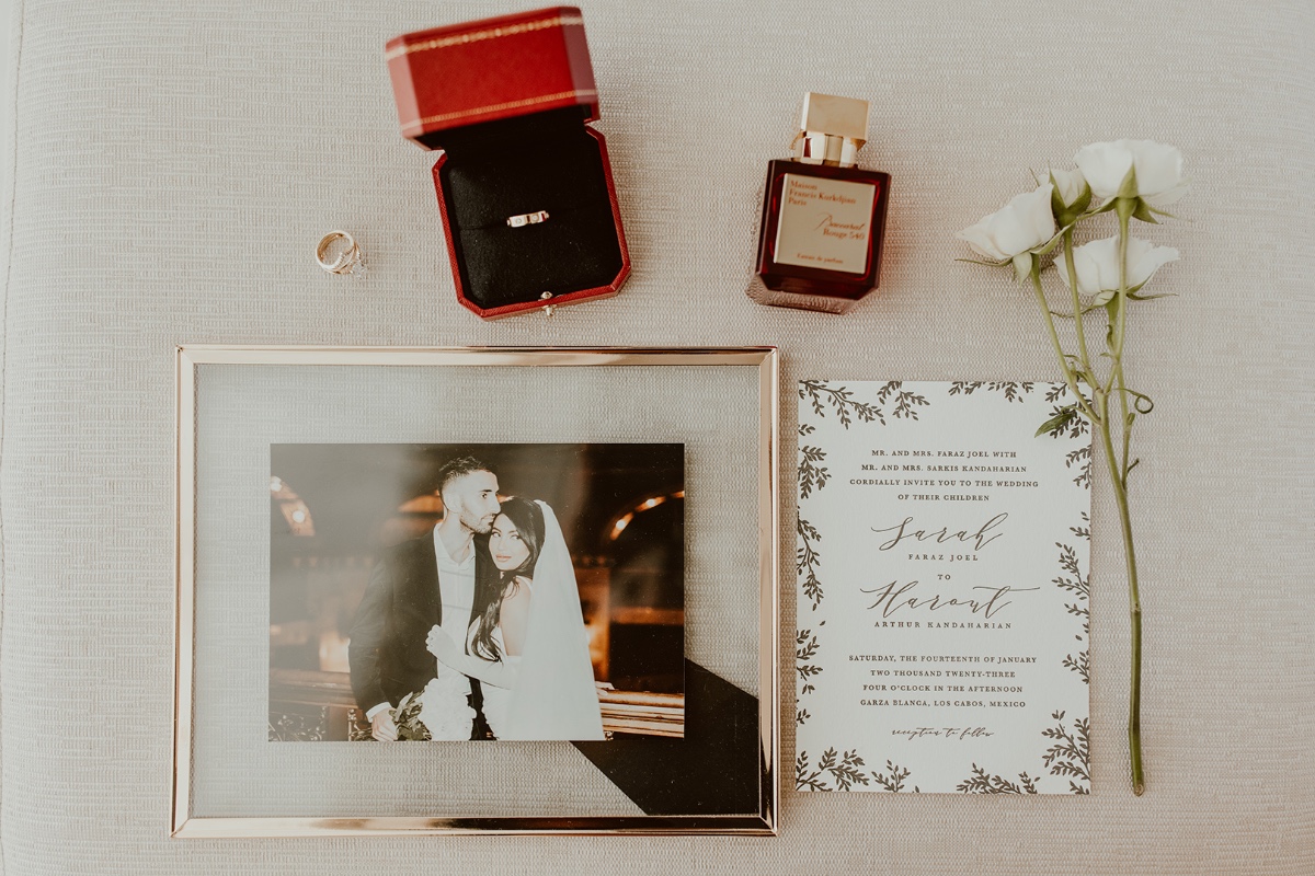 Romantic wedding details with floral invitation