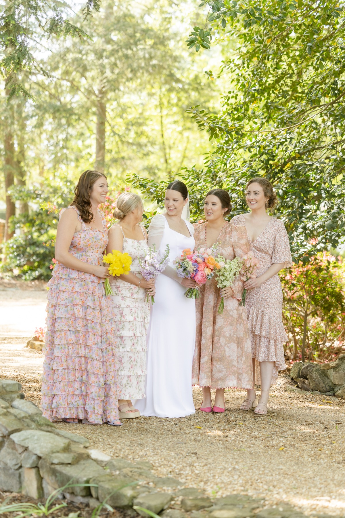 Mismatched floral bridesmaids dresses 