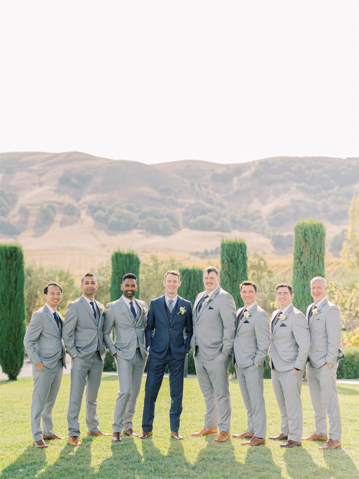 light gray and navy wedding suits from the modern groom