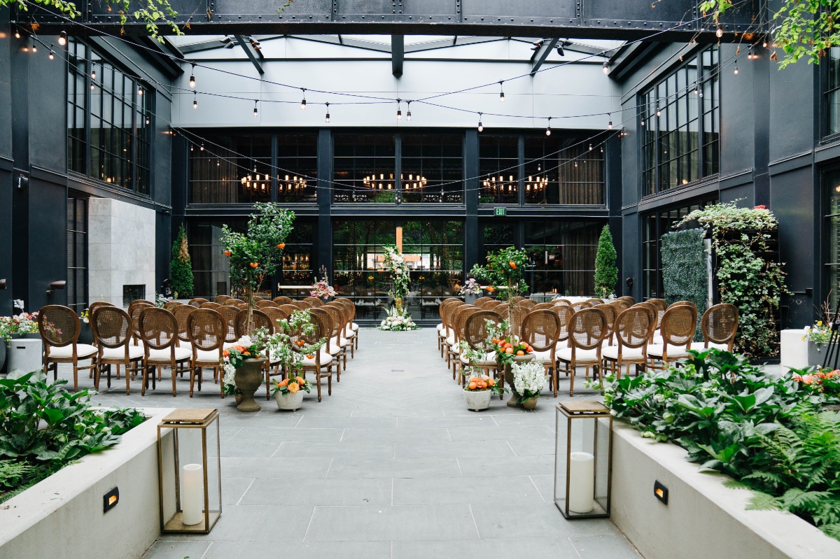 citrus themed wedding ceremony in courtyard