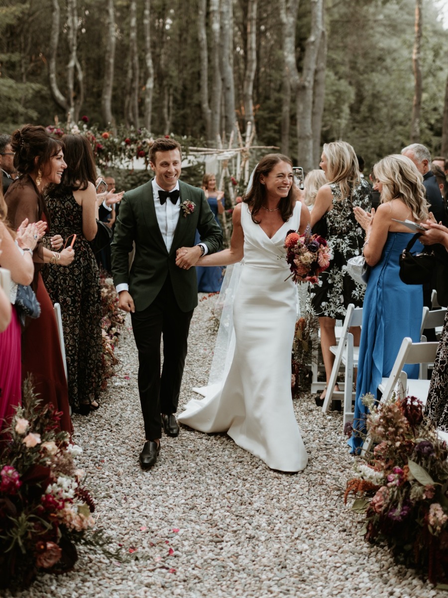 Black tie style was transported to the woods for this modern wedding