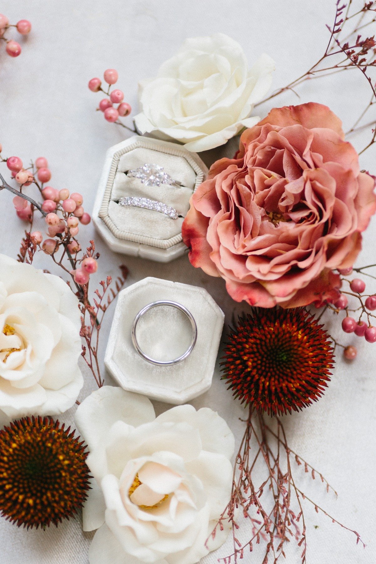 wedding rings with fall foliage 