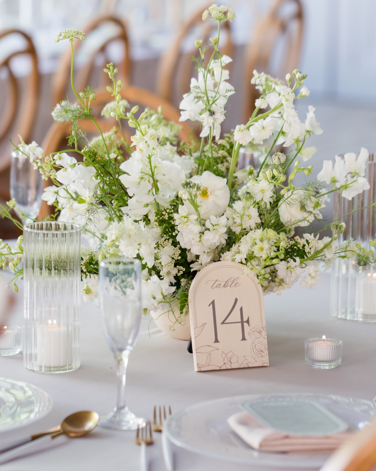 wood table numbers and all white floral centerpieces for wedding 