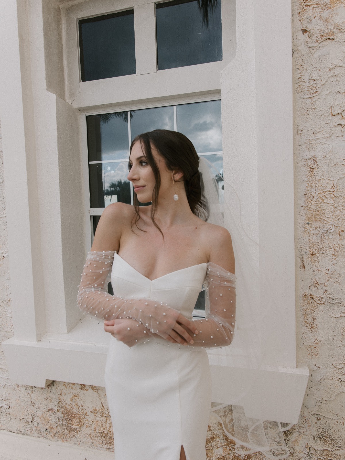 modern wedding dress with pearl details