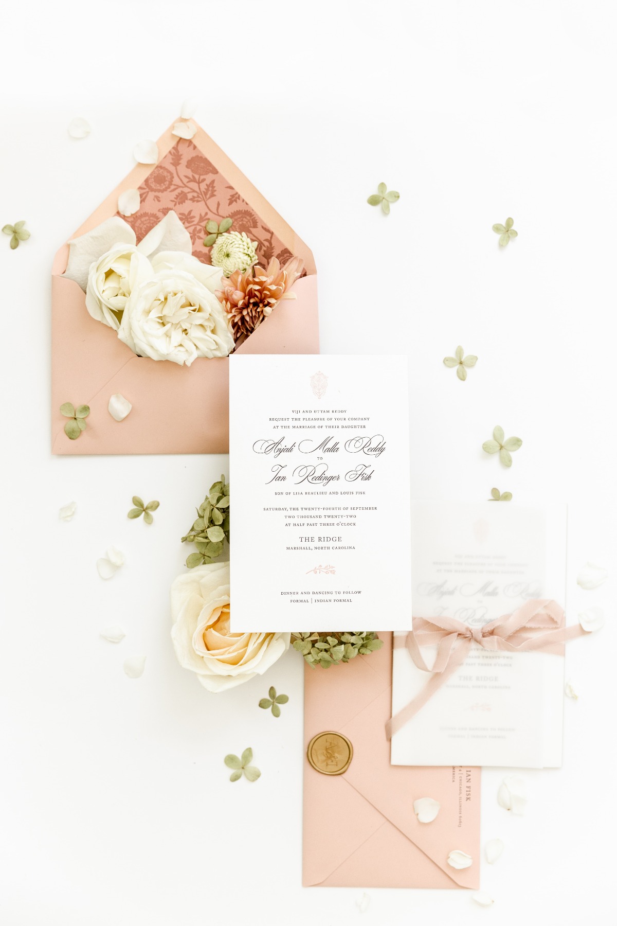 calligraphed pink wedding invitations