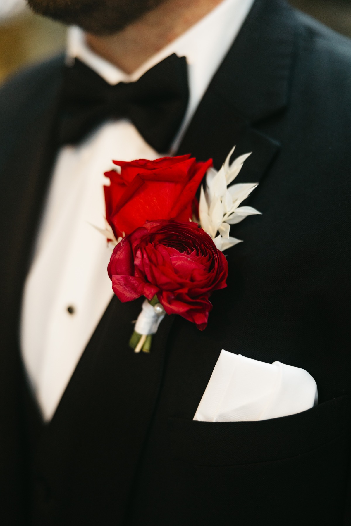 classic red boutonniere