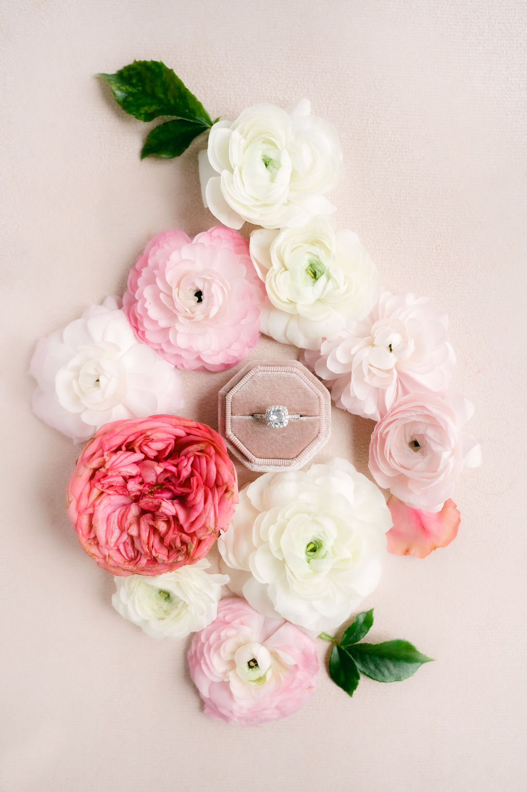 Pink florals with timeless diamond wedding ring 