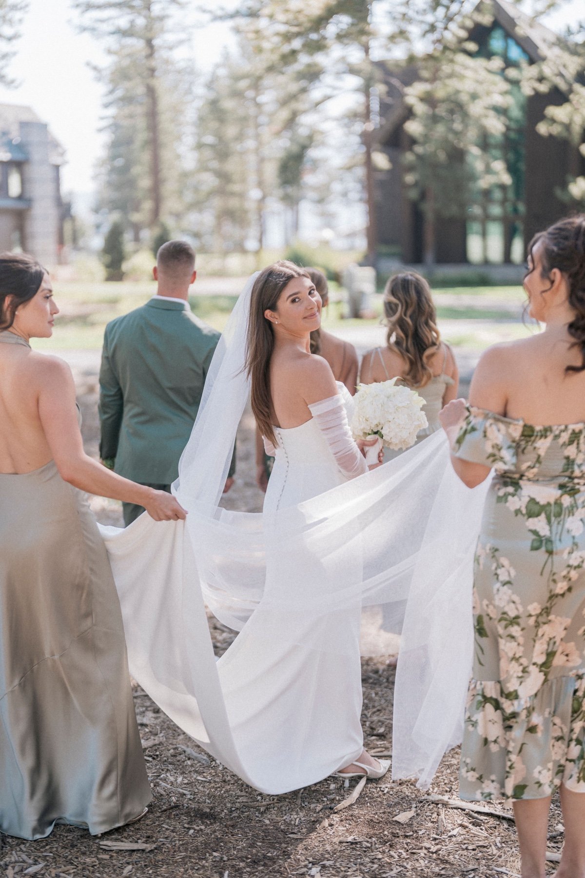 Bridal party carrying dress 