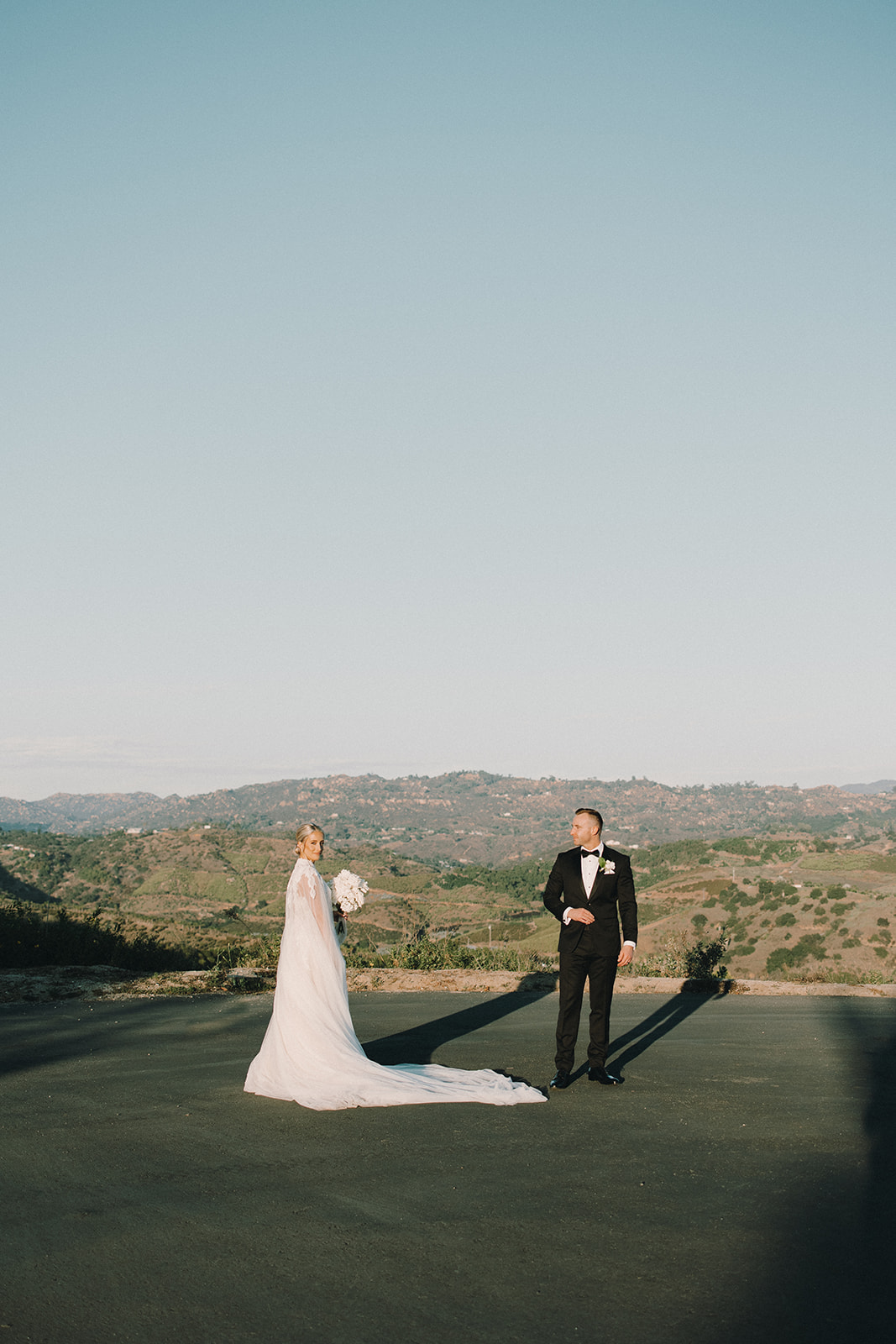 You didn’t know you wanted a bridal cape until this luxe fall wedding