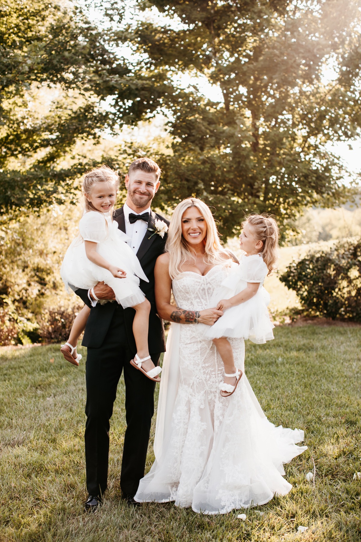 Austin Watson and family at wedding with daughters
