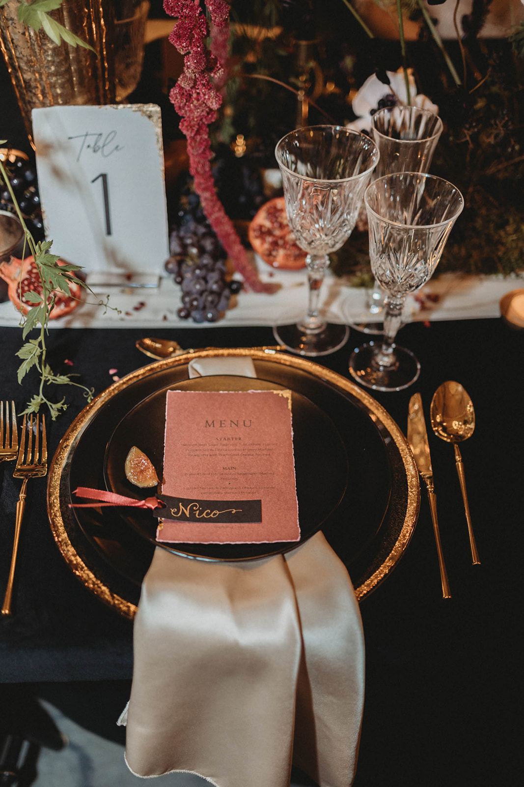 Black and gold reception tablescape