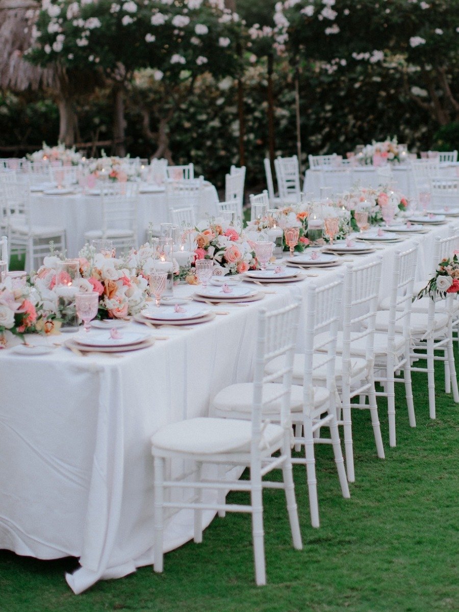 An elegant sunset palette accentuated this Four Seasons Maui wedding
