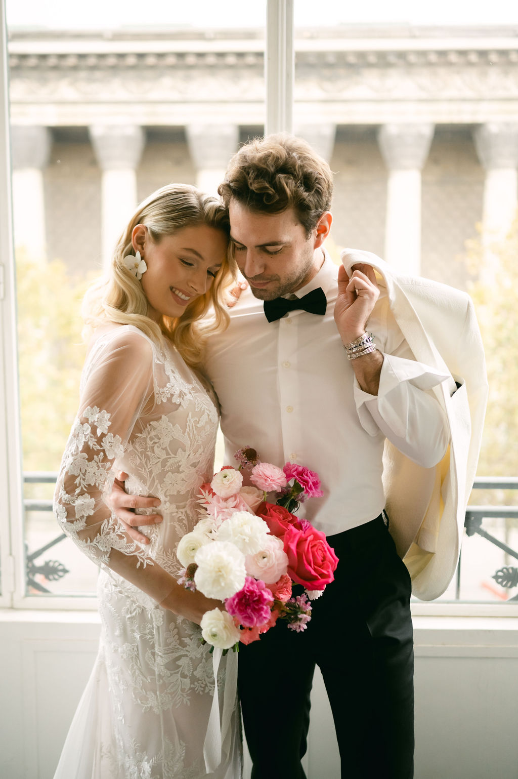 Paris bride and groom with hot pink bouquet 