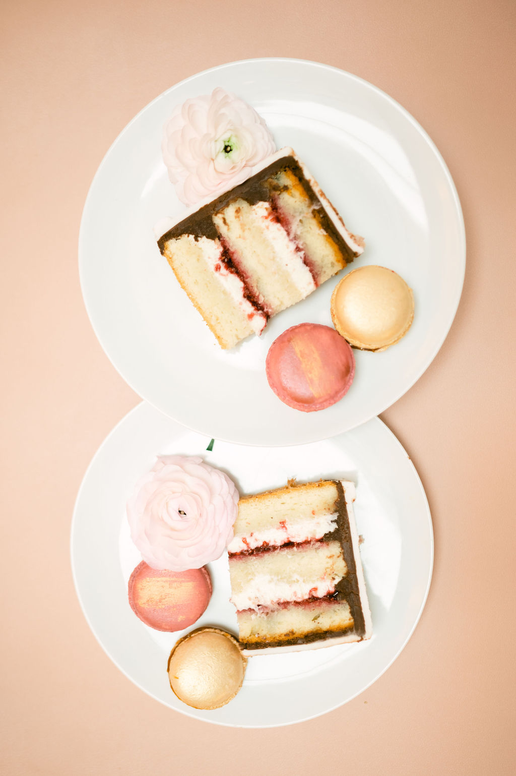 French wedding cake slice with macarons 